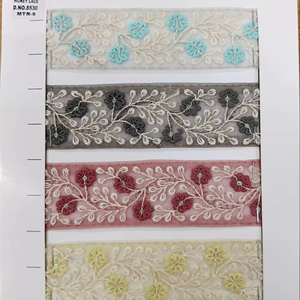 Venta al por mayor tela de encaje de cordón nigeriano con piedras bordado pesado encaje para vestido de fiesta de boda - Product Image 1