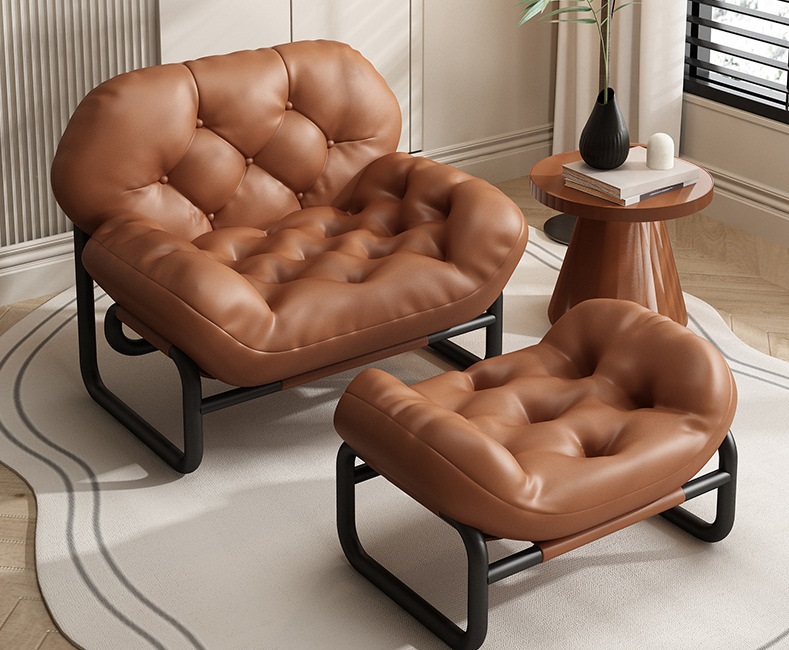 Fauteuil marron avec repose-pieds (pieds noirs)