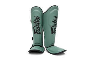 Espinilleras Premium de Muay Thai: Diseñadas con maestría para una máxima protección durante el sparring intenso y el trabajo con saco de boxeo pesado. - Product Image 2