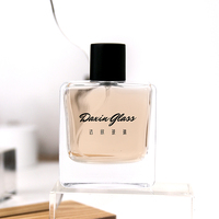 Bouteille de parfum en verre portable de 50ml avec joint de cou à sertir Applicateur de pulvérisation d'atomiseur de Cologne carré transparent pour voyage