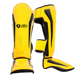 Espinilleras ajustables con ajuste seguro diseñadas para brindar comodidad y estabilidad durante las sesiones de entrenamiento - Product Image 1