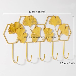 Luxurious Gold Finished Metal Wall Hooks Hangers for High-end Interiors Providing Both Style and Practical Storage Options - Product Image 1