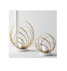 Fabrica y exportadores de candelabro decorativo para el hogar de diseño vintage, candelabro de anillos de mármol y metal de alta calidad - Product Image 1