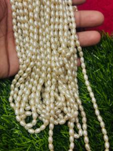 Perles d'eau douce 4.5 à 6.5 MM Forme ovale lisse prête à expédier en couleur blanche - Product Image 2