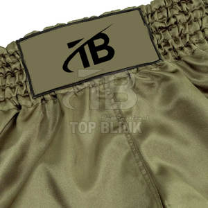 Novedad de 2025, pantalones cortos de Muay Thai de alta calidad, diseño deportivo con cierre de cintura elástica, pantalones cortos tailandeses de patrón sólido - Product Image 4