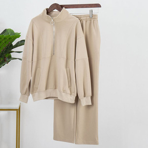ชุดวอร์มผ้าฝ้ายสีทึบสำหรับฤดูใบไม้ร่วงเสื้อวอร์มมีซิปครึ่งแขนพร้อมกางเกงวอร์มขาตรงชุดสองชิ้นสำหรับผู้หญิงไหล่ตก - Product Image 6