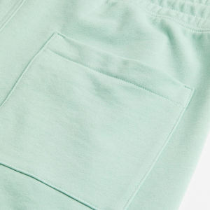 กางเกงคาร์โก้ของผู้ชายกางเกงขาสั้นสำหรับใส่วิ่งออกกำลังกายเล่นกีฬาสีพื้นชุดฝึกออกกำลังกายในยิมกางเกงวิ่งแบบลำลองออกแบบโลโก้ได้ตามต้องการ - Product Image 6