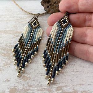 Pendientes de cuentas de semillas de cristal tejidos a mano de arte popular, joyería de estilo bohemio con borla larga para mujer - Product Image 1