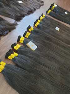 Minh Khang, fournisseur de cheveux haut de gamme du Vietnam, propose des extensions de cheveux humains de luxe, naturels, noirs, non-Remy, à texture lisse, en vrac de 100g. - Product Image 3
