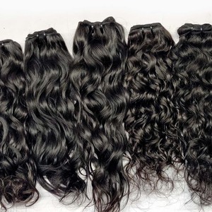 100% extensions de cheveux humains vierges non transformés avec vague naturelle Extensions de cheveux ondulés indiens bruts non traités de qualité supérieure - Product Image 1