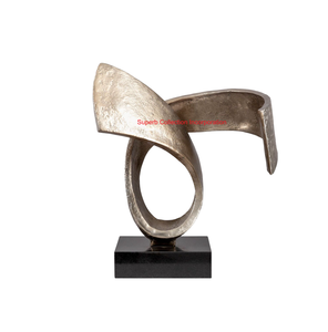Sculpture moderne en métal avec nœud en ruban et base en granit noir Décoration contemporaine élégante pour la maison et le bureau Accent décoratif - Product Image 1