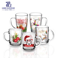 Promo Hadiah Natal Grosir Cangkir Kaca Desain Natal Cetak Dekal untuk Minum Air, Kopi, Jus dengan Gagang