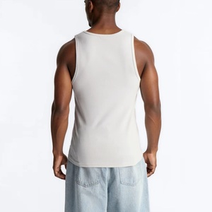 Débardeur de sport côtelé moulant en coton et élasthanne pour homme, idéal pour la course et l'entraînement, avec compression et coupe ajustée - Product Image 2