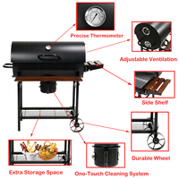 Grand barbecue fumoir en acier en forme de tonneau avec deux tables latérales pour les fêtes en plein air