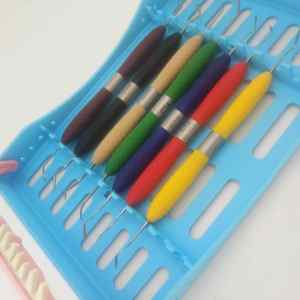 Juego de instrumentos de relleno compuesto Dental, herramientas de odontología restauradoras de acero inoxidable con asas de silicona - Product Image 1