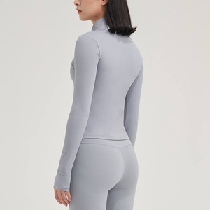 Venta al por mayor de manga larga ropa deportiva de entrenamiento diseño cómodo Color sólido Yoga Top chaqueta con cremallera mujeres chaquetas de entrenamiento - Product Image 5