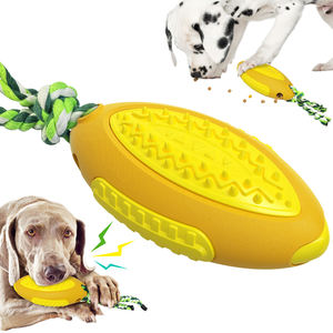 Juguete de goma para perros Juguetes para masticar Pelota de comida Pelota de rugby para perros de plástico - Product Image 2
