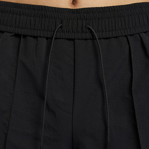 Short de course à séchage rapide pour femmes avec taille élastique Short d'entraînement actif à motif solide en gros avec poches Service OEM - Product Image 2