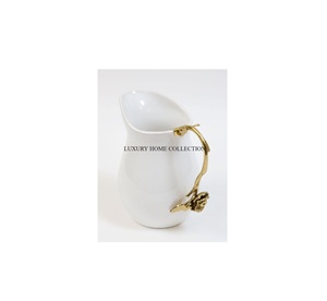 Vintage metal fancy beverage <b>jug</b> with intricate detailing and an exquisite handle ideal for classic and modern interiors - Product Image 1