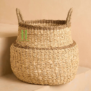 Cesta de Almacenamiento de Mimbre Hecha a Mano, Irresistible Cesta Tipo Barriga con Flecos de Rafia, Hecha en Vietnam - Product Image 1