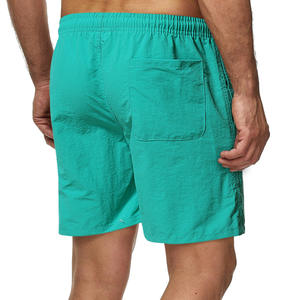 2024 secado rápido tamaño grande poliéster Oem logotipo personalizado deportes playa pantalones cortos en Stock verano sudor gimnasio pantalones para correr pantalones cortos para hombres - Product Image 3