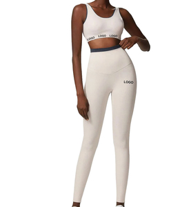 Leggings de cintura alta para mujer, de color sólido, elásticos, sin costuras, estilo deportivo, con logo en la pierna derecha. - Product Image 1