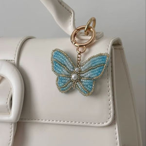 Porte-clés perlé à la main pour femmes, breloque de sac brodée de perles de qualité supérieure - Product Image 1