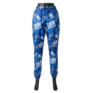 กางเกงกันลมสำหรับผู้หญิงกางเกงกันลมพิมพ์ลายพรางสีฟ้าผ้าโพลีเอสเตอร์พรีเมียมพร้อมพิมพ์โลโก้ที่กำหนดเองได้น้ำหนักเบากางเกงกันลม - Product Image 1