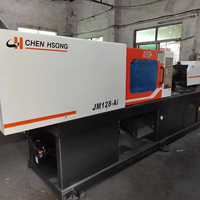 Machine de moulage par injection plastique verticale Jetmaster 2024, bon état de marche, JM 128 tonnes, petite machine à pompe