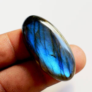 Magnífica piedra preciosa de labradorita azul, con reverso plano, pulida, de forma ovalada, con destellos azules, cabujón de labradorita para la elaboración de joyas. - Product Image 4