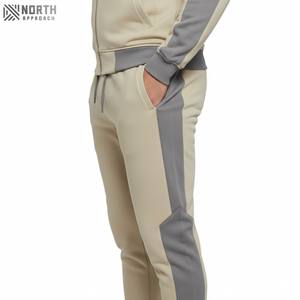 Los mejores fabricantes de ropa de Pakistán, pantalones acampanados personalizados, conjunto de chándal y sudaderas con capucha y pantalones de chándal con cremallera desteñidos al sol y lavado ácido vintage - Product Image 4