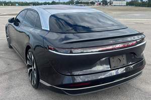 Auto 2024 Air Touring Coupe Turbo AWD, Bajo Kilometraje, Caja de Cambios Automática, Asientos de Cuero, Volante a la Izquierda, Color Oscuro, Funcionamiento a Gasolina - Product Image 3