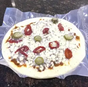 Vietnam'da yapılan dondurulmuş Pizza ambalajı için özelleştirilmiş naylon vakumlu plastik torba 3 mühürlü taraf