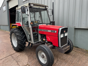 Tractor agrícola Massey Ferguson MF 342 usado, 4x4, con cabina cerrada para trabajo de campo, en venta a precio económico. - Product Image 2