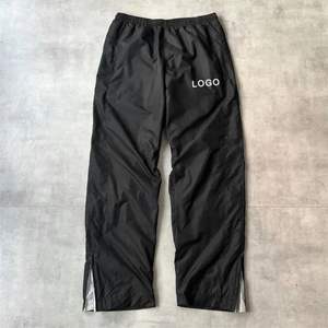 ออกแบบโลโก้ตามสั่ง กางเกงวอร์มขายาวทรงหลวมบุผ้าสีดำคุณภาพสูงสำหรับผู้ชาย ทำจากไนลอน มีซิป - Product Image 1