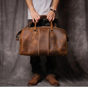 2025 nueva tendencia bolsa de lona de viaje redonda grande multifuncional impermeable cuero genuino estilo de moda moderno - Product Image 2