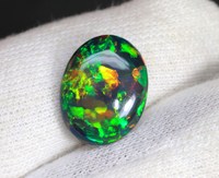 Superbe pierre précieuse d'opale noire éthiopienne Gemmes d'opale noire en vrac Glowing Welo Multi Flashy Cabochon noir éthiopien Cadeau pour elle
