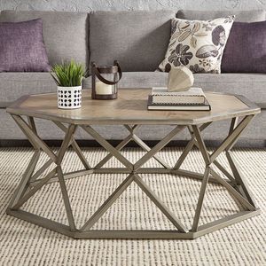 Table basse en métal pur avec insert en verre trempé créant une pièce maîtresse visuellement frappante et fonctionnelle - Product Image 1
