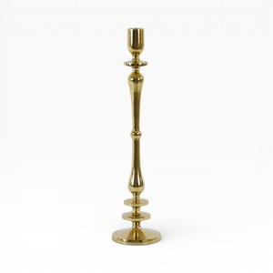 Porte-bougie unique en métal doré élégant avec un design tourné lisse pour un style luxueux - Product Image 4