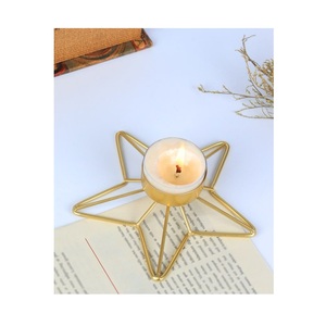 Portavelas Decorativo de Metal con Diseño de Estrella y Patrones Intrincados, Ideal para Bodas, Fiestas, Festivales y Celebraciones Especiales - Product Image 1