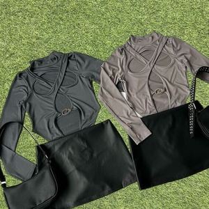 เสื้อแขนกุดกลวงออกแนวพังค์สีดำดีไซน์ไม่สมมาตรเสื้อครอปแขนยาวเสื้อกล้ามเสื้อครอปสำหรับฤดูร้อนตัวหนาแฟชั่นสไตล์กรันจ์ทันสมัย - Product Image 4