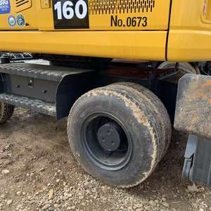 Excavadora de Ruedas Komatsu PC160 de 16 Toneladas, Usada, de Segunda Mano, de Tamaño Mediano, Capacidad de la Cuchara de 0.65m3, Potencia de 82.4KW, en Venta, 99% Nueva - Product Image 3