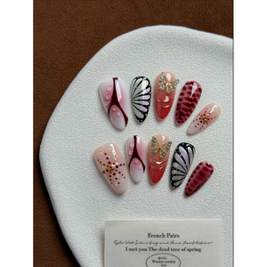 Crimson Wings Press-On Nail Art: Elegante design ad ala per l'arricchimento delle unghie - Product Image 1