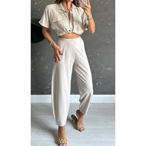 Pantaloni a palloncino Color pietra da donna con tendenza in vita elastica in Lycra