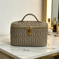 Sac de rangement de maquillage portable de luxe de haute qualité, en PU crème, pour femmes, avec fermeture éclair, élégant et durable