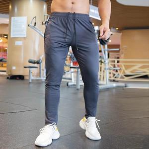 Vente en gros Pantalons d'entraînement de haute qualité à taille élastique, légers et solides, joggings de sport unisexes pour hommes - Product Image 2