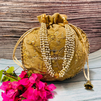 Nouvel arrivage de sac ethnique de travail de broderie dorée fait à la main pour femmes cadeau de mariage beau sac de travail brodé Potli pour femmes