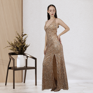 Elegant Soft Touch Golden Sequin Gown Dress with Halter Neck and <b>Thigh</b> Slit and Long Trail for Event Use from Indian Supplier - Product Image 3
