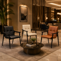 Fauteuil en cuir capitonné moderne