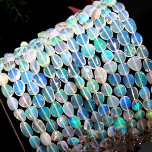 Perles de pépites d'opale éthiopienne naturelle de forme ovale lisse blanche pour la fabrication de bijoux à la mode perles de pierres précieuses - Product Image 2